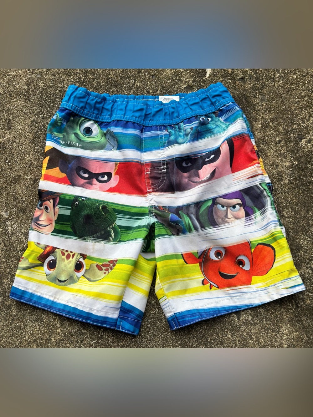 Disney Multicolor Character Stripe Swim Shorts — Blue Waistband